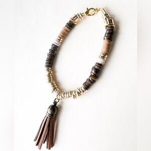 Elegant Gold and Brown Beaded Bracelet with Tassel